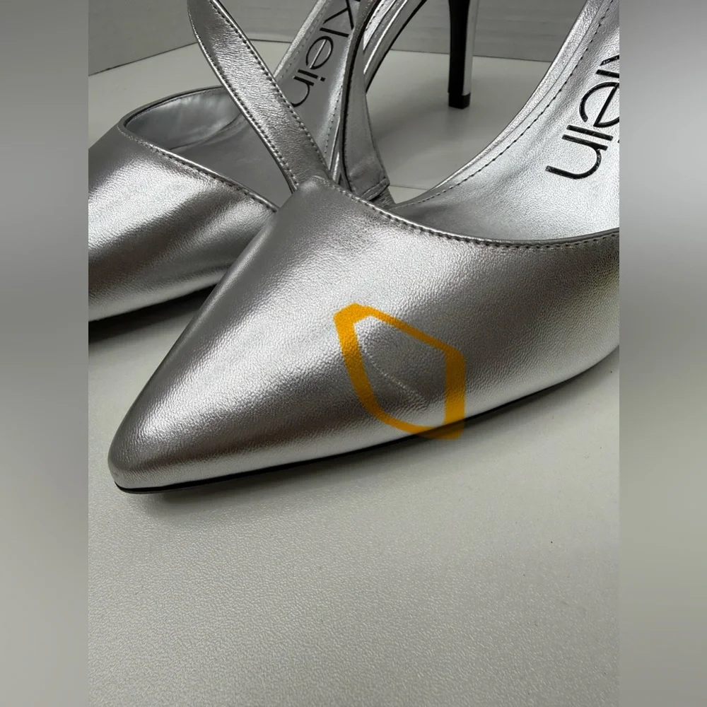 NEW  Calvin Klein Gilisa Asymmetric Strap Pumps in silver leather size 10M